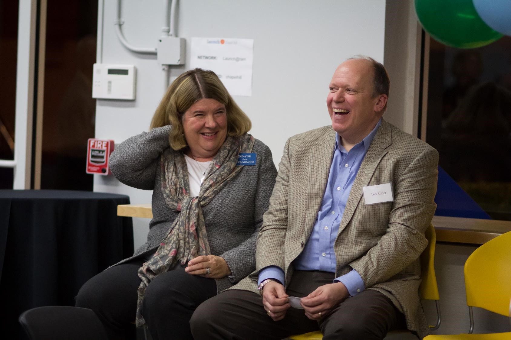 Pam Hemminger, mayor of Chapel Hill, and Ted Zoller, T.W. Lewis Clinical Professor of Strategy and Entrepreneurship and Director of the Center for Entrepreneurial Studies, help lead the celebration.
