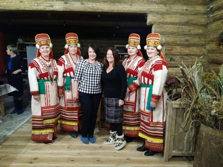 Dina Rousset with traditional dancers and the local director of arts and culture before an evening presentation to a group of women entrepreneurs in Ardatov.